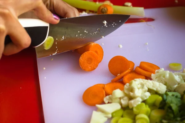 Young Woman Chops Carrots Big Knife — Stock Photo, Image