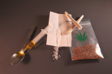 Drugs including heroin, crack and marijuana clipart