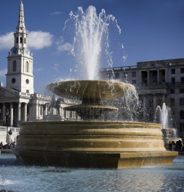 Fountains on Trafalgar Square in London clipart