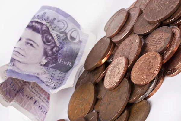 British pounds and penny — Stock Photo, Image