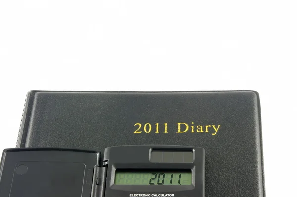 Tagebuch und Taschenrechner — Stockfoto