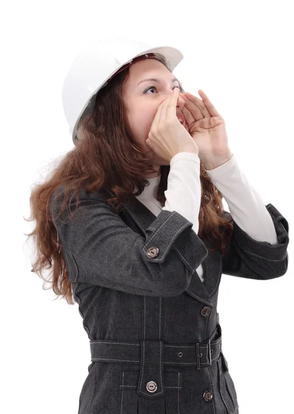 Giovane architetto donna che indossa un casco protettivo, in piedi. Isolato su wh — Foto Stock
