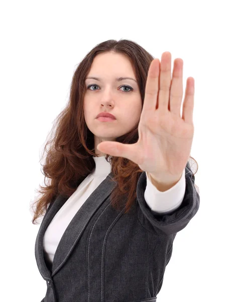 Ernsthafte Geschäftsfrau macht Stoppschild auf weißem Hintergrund, Fokus auf Geschäft — Stockfoto