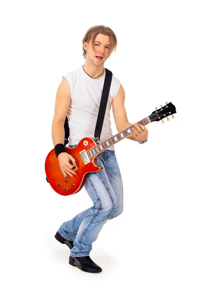 Portret van jonge trendy kerel springen met elektrische gitaar geïsoleerd op wit — Stockfoto