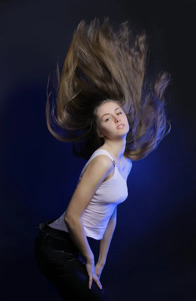 stock image Sexy woman dancing, dark background