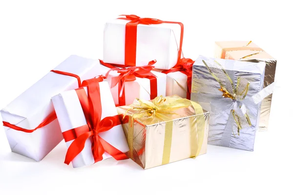 Holiday gift boxes decorated with ribbon isolated on white background. — Stock Photo, Image