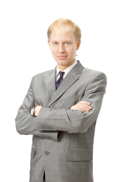 Porträt eines lächelnden jungen Geschäftsmannes, der vor einem isolierten weißen Bac steht — Stockfoto