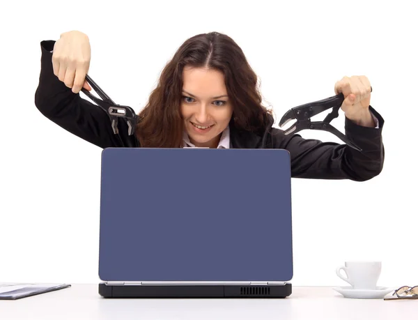 Young woman about to break the computer. A part of the office rage series. — Stock Photo, Image