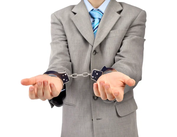 Worried caucasian middle aged businessman in handcuffs . Studio shot. White — Stock Photo, Image