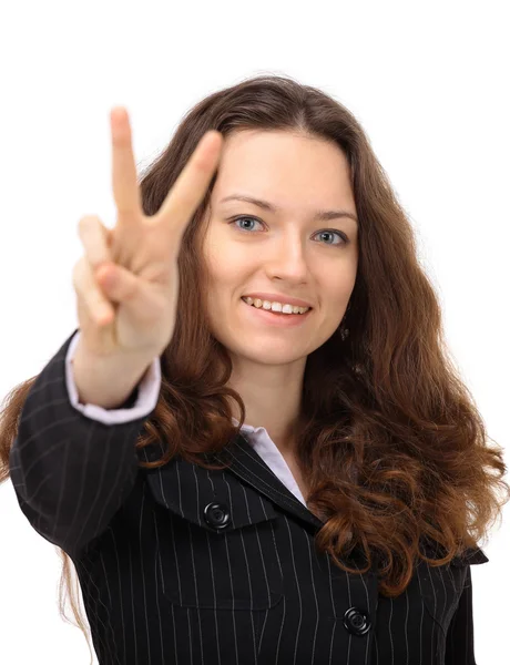 The beautiful business woman shows a symbol on a white background — Stock Photo, Image