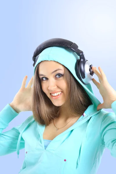 The beautiful young woman with headphones — Stock Photo, Image