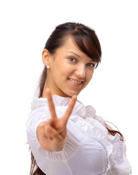 A bela mulher de negócios mostra um símbolo em um fundo branco — Fotografia de Stock