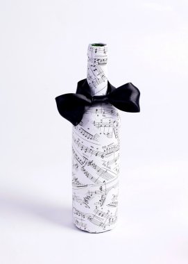 Bottle with the notes and tie clipart