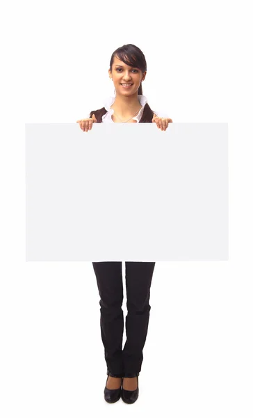 Красивая деловая женщина показывает на белом фоне — стоковое фото