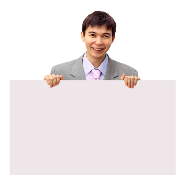 O jovem homem de negócios em um fundo branco — Fotografia de Stock