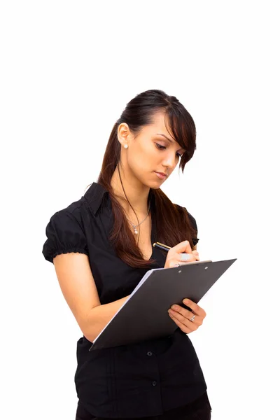 Die schöne Geschäftsfrau schreibt auf weißem Hintergrund — Stockfoto