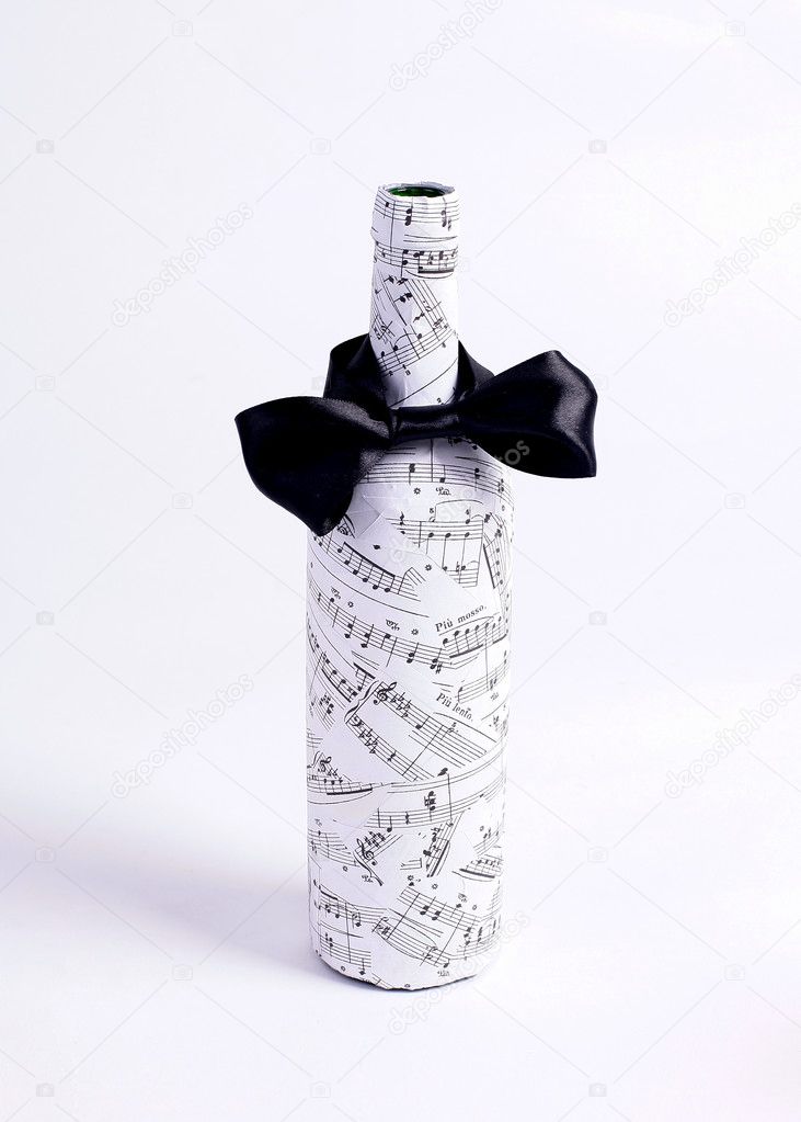 Bottle with the notes and tie