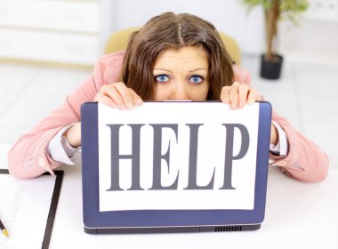 The beautiful business woman at office asks of the help clipart