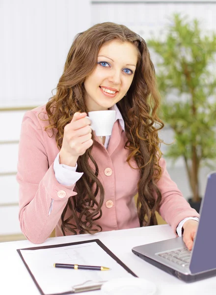 The beautiful business woman at office — Stock Photo, Image