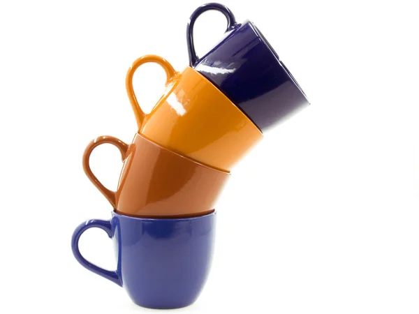 Four Cups Different Colours Standing Each Another Column — Stock Photo, Image