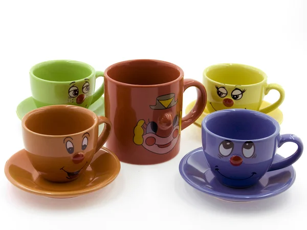 Four Kid 's Cups Beside a Clown' s Cup — стоковое фото
