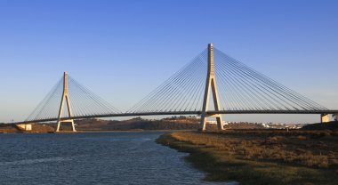 International bridge in the Guadiana river between spain and portugal clipart