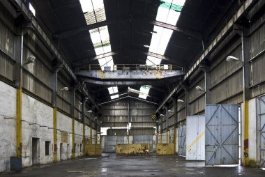 Abandoned heavy truck garage in a mine clipart