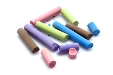 Group of colored chalks used by school clipart