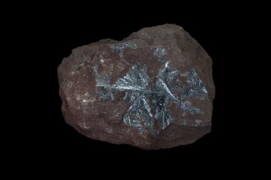 Antimony almost always contains some arsenic, but may also contain traces of silver, iron, and sulfur. Isolated in black background. clipart