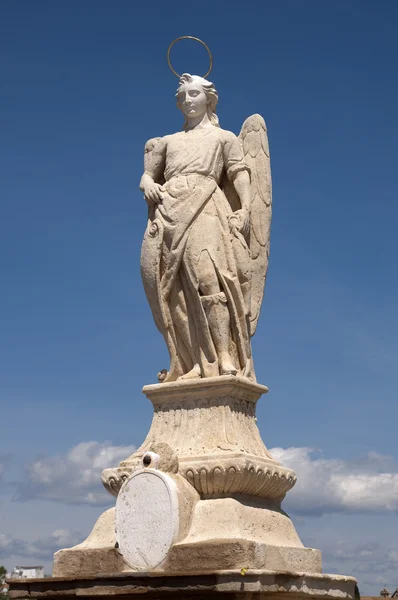 stock image San Rafael Archangel statue in the Roman bridge, Cordoba, Andalusia, Spain