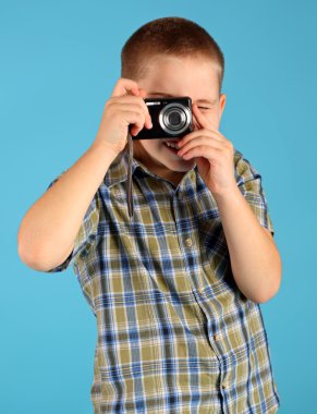 Мальчик с фотоаппаратом