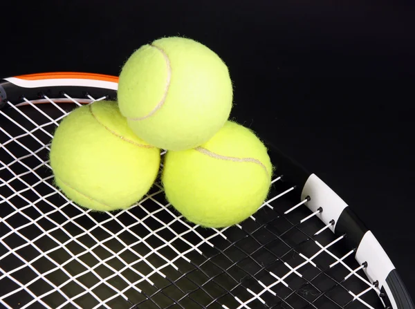 Tennis racket and balls — Stock Photo, Image