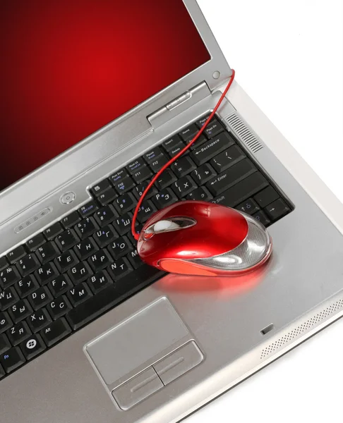 stock image Red computer mouse on a laptop