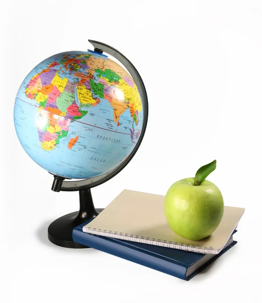 stock image Apple, globe and books