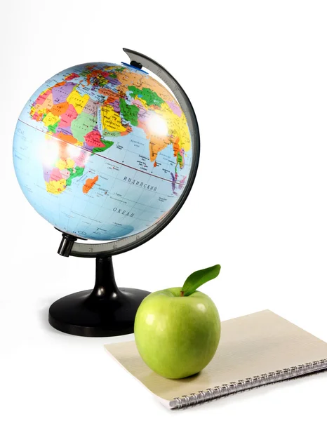 Stock image Apple, globe and books