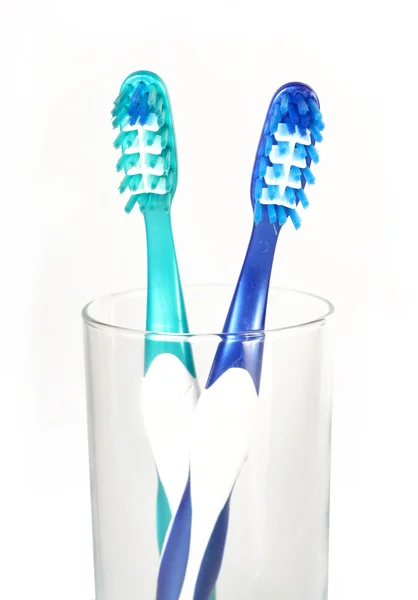 Зубные щетки в стакане — Stock Photo, Image