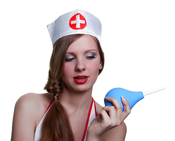Сексуальная медсестра в нижнем белье позирует в больнице