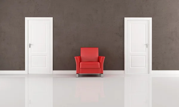 Dvě dveře a červené křeslo — Stock fotografie