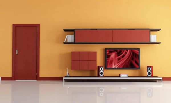 TV LCD e impianto audio in una sala arancione e rossa — Foto Stock