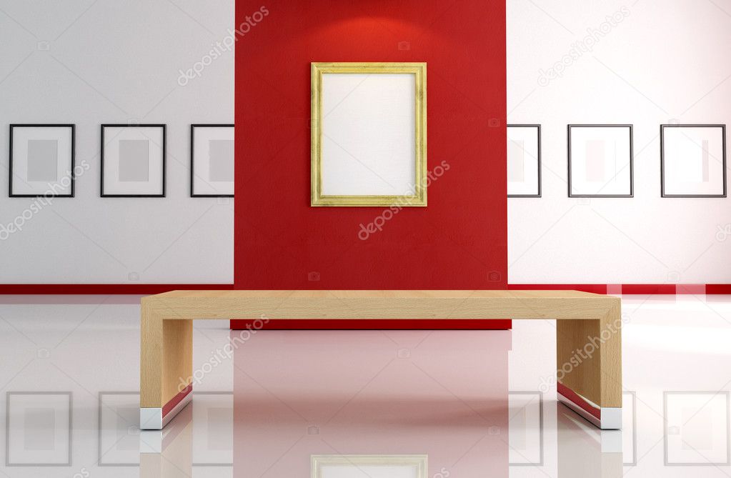 Gold empty frame on red wall