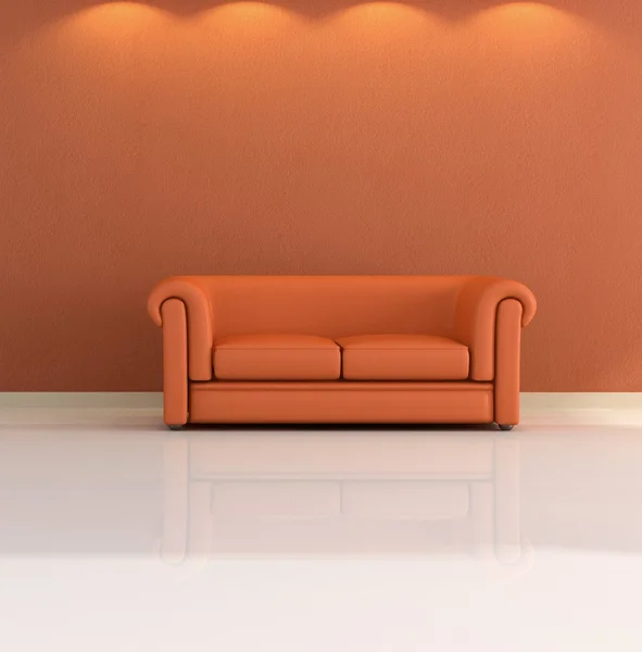 Orange classic couch Royalty Free Stock Images