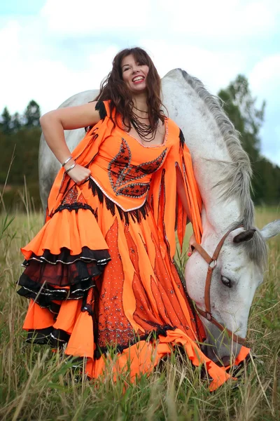 Beautiful Gypsy Dancer Poses Next Grey Horse Field — Stock Photo, Image