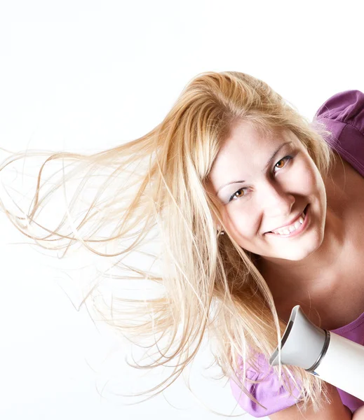 Retrato de uma menina com um secador de cabelo Fotos De Bancos De Imagens