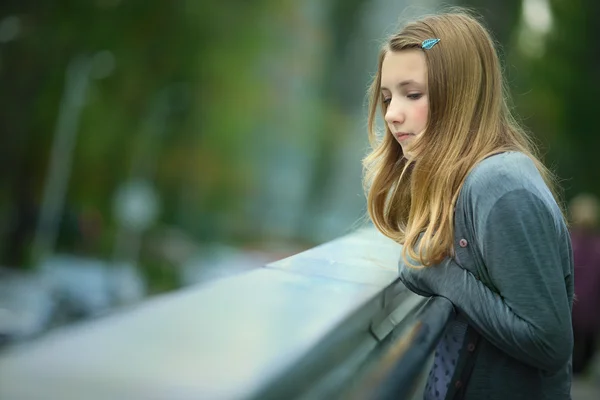 stock image A nice thoughtful young girl expects someone