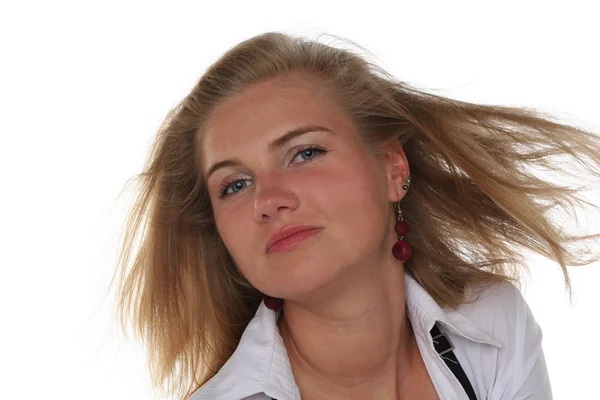 Portrait of young blond woman with Fluttering hair