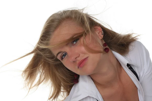 Portrait of young blond woman with Fluttering hair