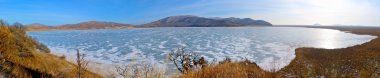 Panorama of the lake Rodnikovoye. clipart