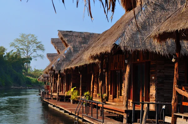 stock image Sunny bungalows in Thailand on river