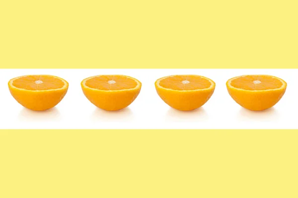 Line Small Orange Halves White Horizontal Band Pale Yellow Background — Stock Photo, Image