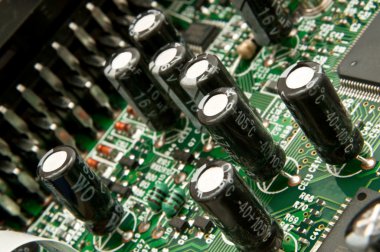 Close up capturing a portion of printed circuit board. clipart